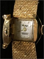 Woman Fashion Watch Gold tone Locket Style