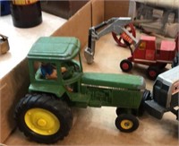 4 tractors/ track hoe