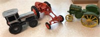 3 toy tractors