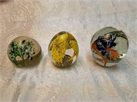 3 floral paperweights