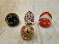 4 assorted  paperweights