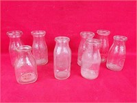 Nine Vintage Milk Bottles