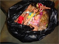 Trash Bag and Luggage Full of Dolls