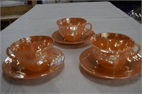 Carnival Glass Cups and Saucers