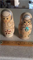 Russia nesting dolls. Signed on the bottom Times 2