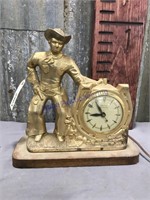 Brass cowboy electric clock