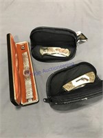 2 pocket knives in cases, watch, ring
