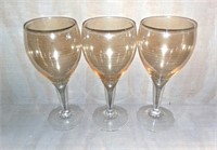 Three Amber Wine Glasses