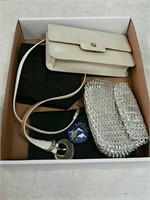 Box of designer handbags