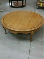 Round coffee table by heritage