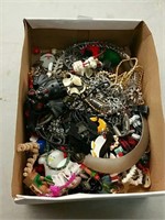Box of costume jewelry and pins