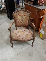 Carved needlepoint arm chair