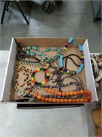 Box of native necklaces etc