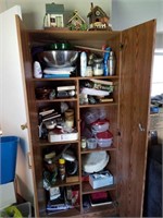 Cabinet and contents in kitchen