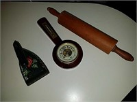 Antique sad iron, barometer, rolling pin