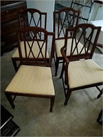 Four matching vintage kitchen chairs one Captain