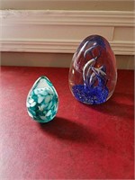 Two hand blown art glass paperweights
