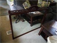 Large mirror with wood carving in need of repair