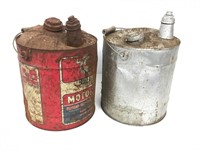 Two vintage gas cans.