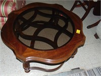 Round glass top coffee table - good quality