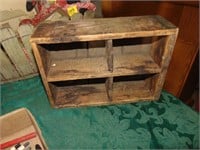 Primitive shelf made from a stove drawer