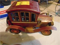 Wind-up friction car. Tin litho?