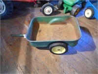 Green pedal tractor wagon