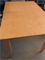 Light Wood Hidden Leaf Dining Table