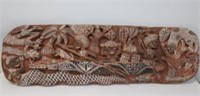 PNG carved painted wood story board