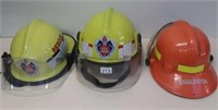 Two NSW yellow firemen's helmets with