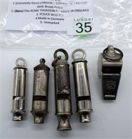 Five various Police Whistles includes