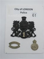 Three City of London Police badges