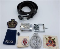 Nine New Zealand buckles badges & belt