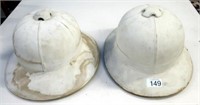 Two vintage pith helmets