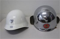 Two vintage German fire helmets
