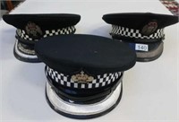 Three Scottish Police peak hats