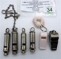 Six various Police whistles includes