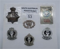 Nine South Australia Police badges (9)