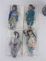 4 poupées asiatiques en porcelaine neuves