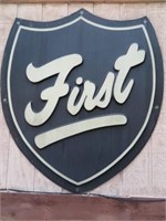 SIGN, "FIRST", 7' X 6' PLASTIC