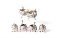 Two pairs of Indian silver salts & pr of castors