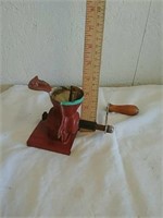 Vintage metal grinder with wood handle