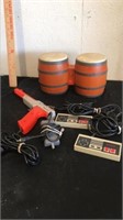 Nintendo game controllers, bongos & gun