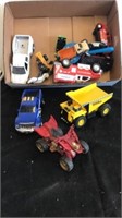Group of toy cars includes Tonka and others