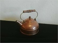 Copper teapot by Revere ware with wood handle
