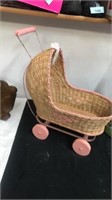 Vintage Whicker doll buggy with wooden wheels