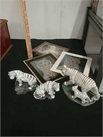 Group of white tiger pictures and figurines