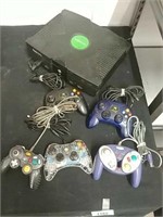 Xbox with 3 Xbox controllers mad cat and intec