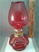 Small glass oil lamp painted red with chimney and