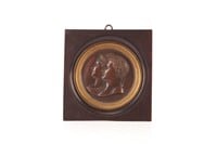 Patinated bronze and gilt Classical figural plaque